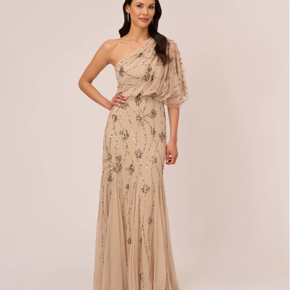 BRAND: ADRIANNA PAPELL  ONE SHOULDER BEADED GOWN IN NUDE